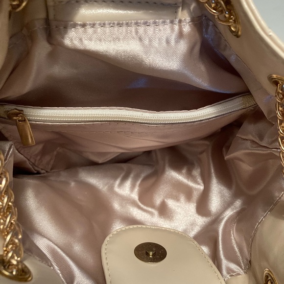 Quilted Mini Satchel Cream vegan leather. Gold-tone accents with a Tassel pull - Picture 7 of 8